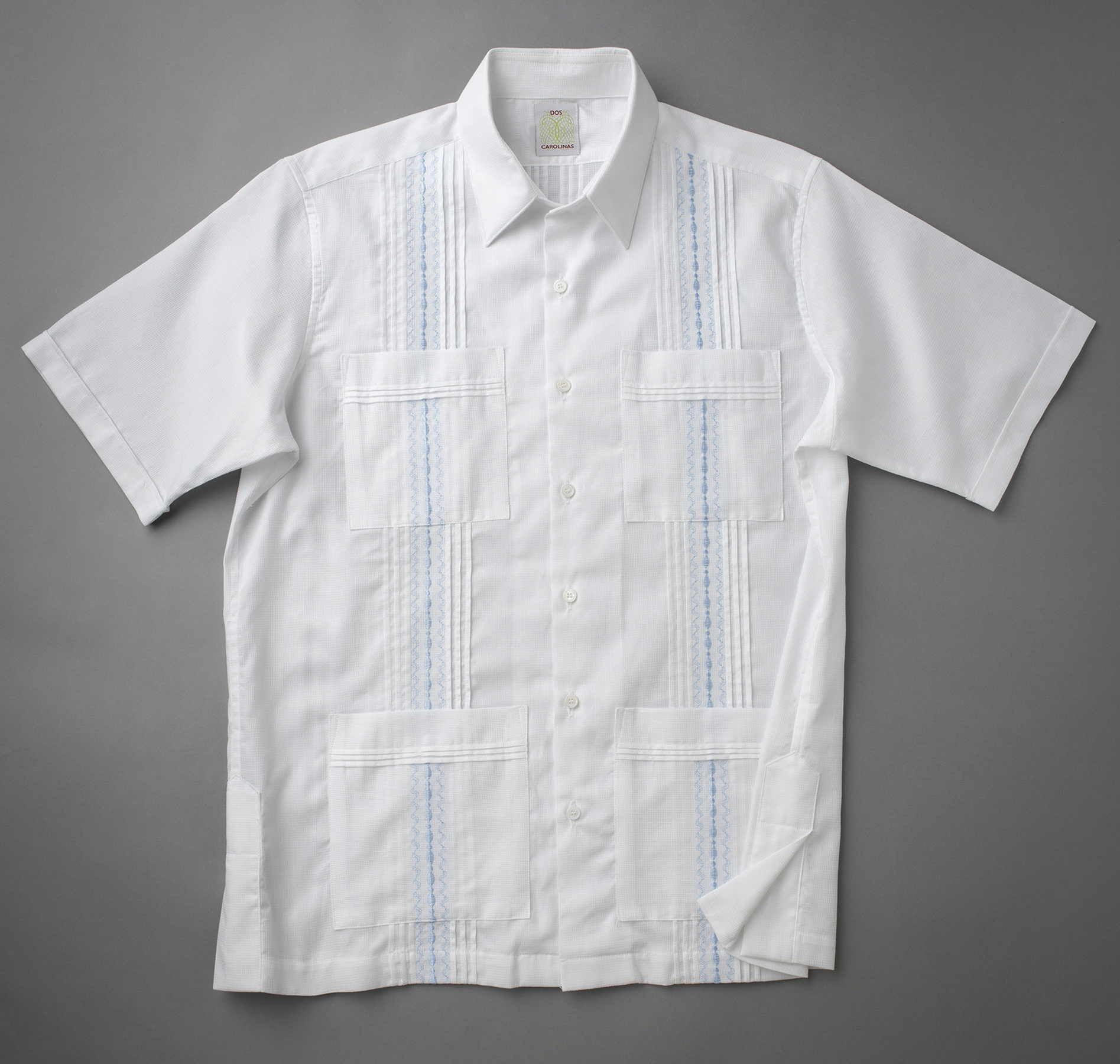 Pique with light blue embroidery detail